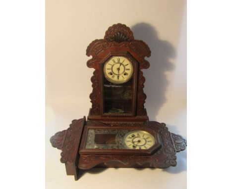 Two late 19th/early 20th Century American Ansonia "gingerbread" wall and shelf clocks with 8 day striking movements, both wit