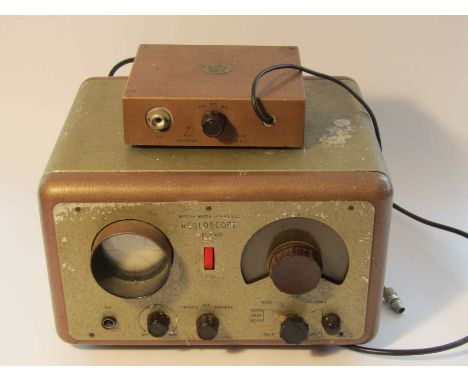 A British Watch Timers Ltd Regloscope Type W950, transducer connector type W935, with a manual of related diagrams