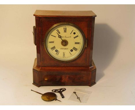 A late 19th Century walnut and brass inlaid mantel clock, painted metal Roman dial signed Camerer Kuss &amp; Co, 8 day striki