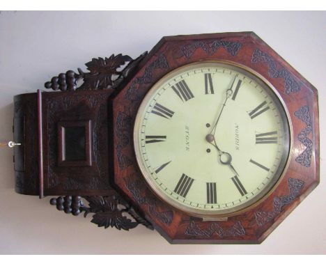 A 19th Century rosewood drop dial wall clock with carved grape and vine mouldings, 14" painted metal Roman dial signed Morris