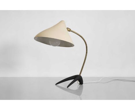 A desk lamp by Louis Kalff (1897-1976) for Philips, 1950s, with original white enamelled conical shade and brass mounts, with