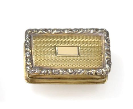 A William IV Silver-Gilt Vinaigrette, by Nathaniel Mills, Birmingham, 1830, oblong, the hinged cover engine-turned and within