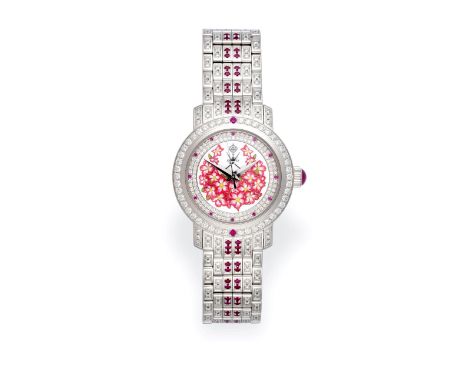 A Lady's 18 Carat White Gold Diamond and Ruby Set Automatic Centre Seconds Wristwatch, retailed by William &amp; Son, London,
