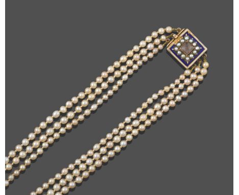 A Three Row Pearl Necklace, the graduated 99:89:96 pearls strung to a square clasp with a hairwork panel centrally within a b