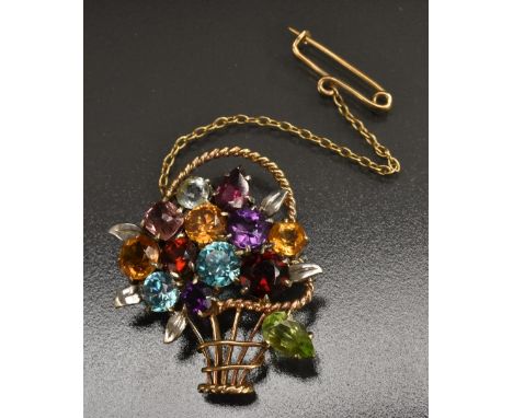 An Edwardian 9ct gold, multi-stone flower basket brooch, the open basket body encrusted with thirteen assorted shape and cut 