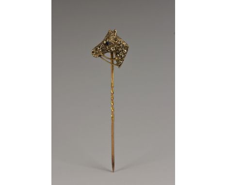 A 9ct gold equestrian horse head diamond and sapphire encrusted stick pin, pave encrusted with thirty nine old rose cut diamo
