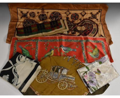A vintage Gucci silk scarf, snaffle bit pattern; a silk scarf tones of grey on black ground, marked Hemes; a Celtic pattern s