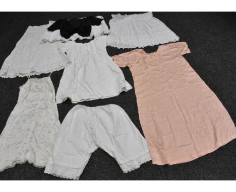 Textiles - a quantity of Victorian and later ladies' underwear to include linen, cotton and other slips, night dresses, bloom