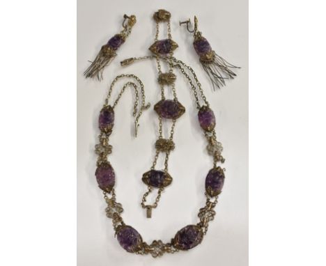 An unusual Chinese carved amethyst and silver filigree parure, comprising necklace, bracelet and pair of earrings, each inset