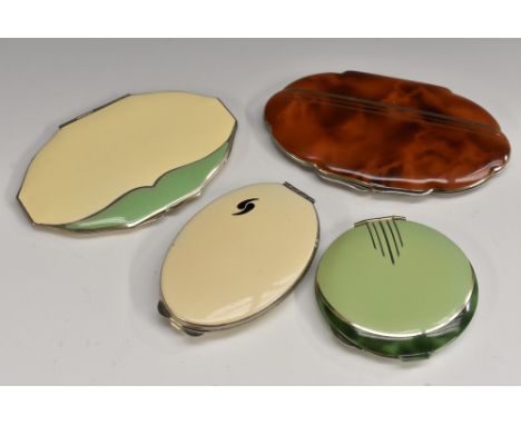 A slimline Rowenta powder compact, shaped oval form, green and cream enamelled chrome; another similar, simulated tortoiseshe