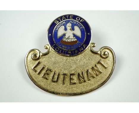  A State of Louisiana Lieutenant's American police cap badge, gilt metal and enamel, 