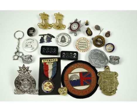 A collection of badges comprising "West Riding Fire Service", "Police Athletic Association"medal dated 1928, St. John's Ambul