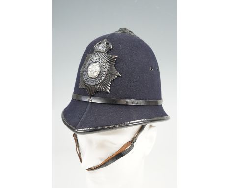 A West Riding Constabulary Custodian helmet, having a two tone night plate with a king's crown, "PC 1443 Lister" in band, siz