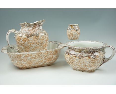 An early Twentieth Century Doulton Burslem wash set, basin 41 cm diameter