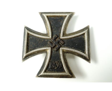 A German Third Reich Iron Cross first class, the pin stamped L/52