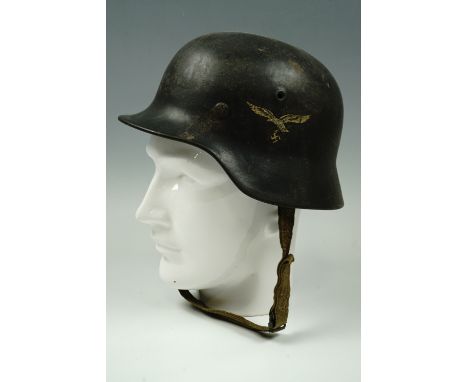 A Second World War German Third Reich Luftwaffe single decal model 1940 steel helmet
