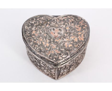 A small heart shaped electroplate ring or trinket box containing sundry items of Victorian and later costume jewellery etc