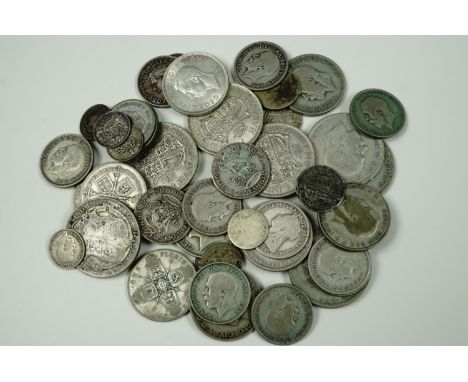 A quantity of pre-1947 GB silver coins, including a small number of pre-1920 issues, 315 g