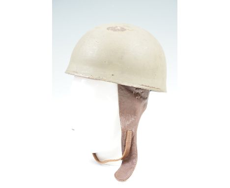 A Second World War British Army motorcyclist's steel helmet, dated 1942