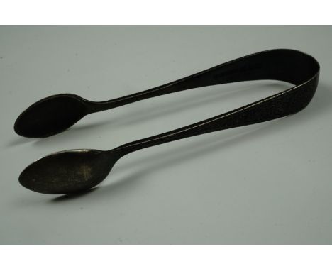 A pair of silver sugar tongs, Birmingham, 1890, 9 cm