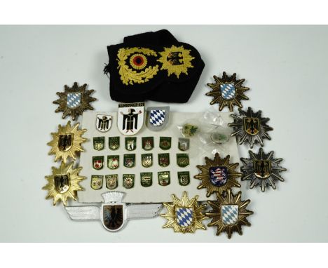 German police cap badges, arm band and enamel badges