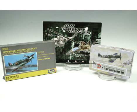 A boxed "Air Strike 1" model aircraft kit together with Airfix playing card games set etc