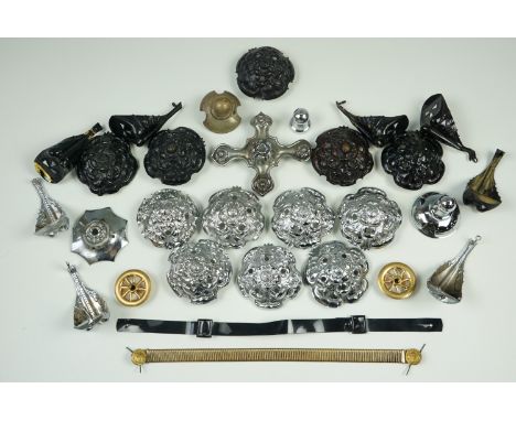 A quantity of police helmet fittings, including rose tops and cockscombs