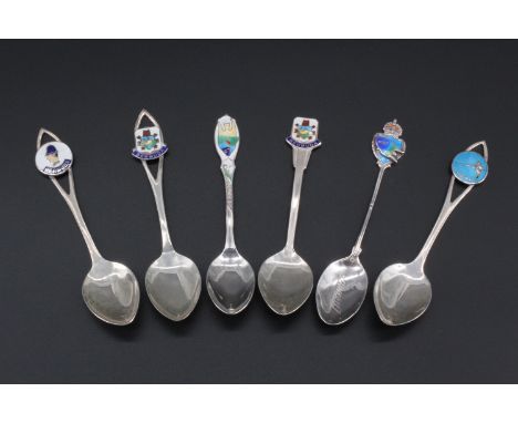 Six white metal souvenir spoons with enamel terminals relating to Bermuda, marked "sterling BMCo" 54 g
