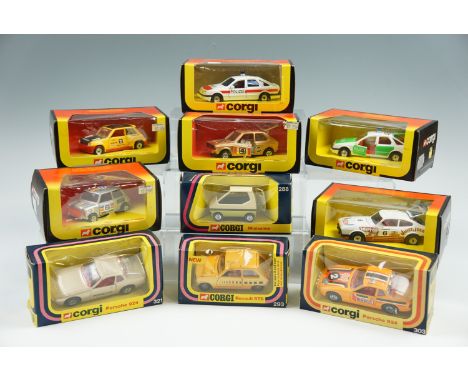 Ten boxed Corgi rally cars, a Sierra police car etc