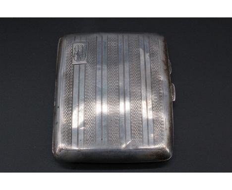 A 1920s silver cigarette case, decorated with banded engine turning, Chester, 1927, 65 g
