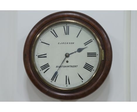 A late 19th Century office dial clock by C Jackson of Burton on Trent, having a fusee movement and mahogany case, 42 cm