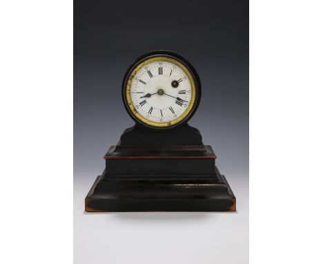 A 19th Century ebonised drum head clock, 20 cm x 12.5 cm x 21 cm high