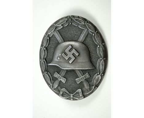 A German Third Reich silver wound badge, bearing the "30" mark indicative of Hauptmünzamt of Vienna