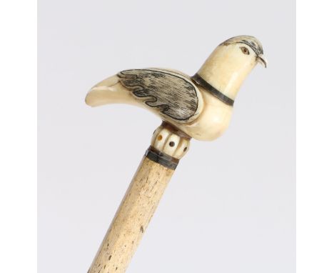 A 19th century whalebone walkingstick, the handle in the form of a sea bird perched on the stick above a angled tapering colu