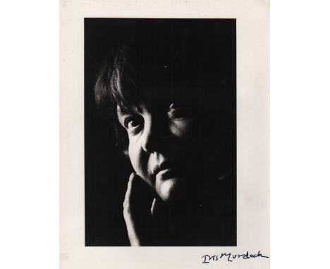 MURDOCH IRIS: (1919-1999) Anglo-Irish Novelist and Philosopher. A good signed 9.5 x 12 photograph of Murdoch in an atmospheri