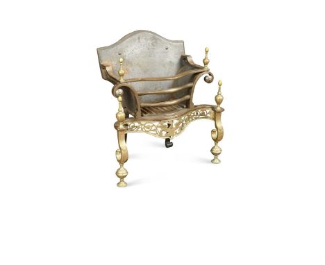 with pierced brass apron on scroll supports surmounted by finials,60 x 53 x 33cmProvenance:Landwade Hall, Exning, SuffolkCond