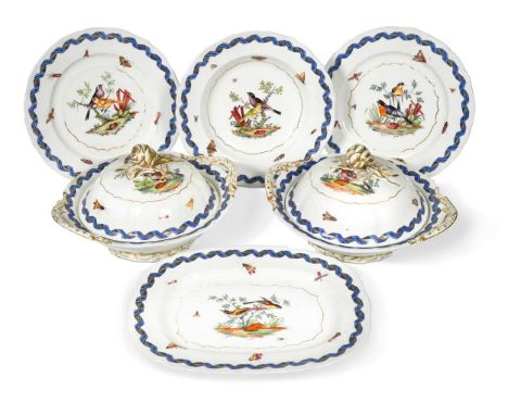 painted with birds, butterflies and insects, within blue and gilt ribbon borders, comprising; twenty-two plates, two two-hand