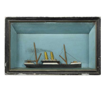within a glazed picture frame case, together with two further small model boats,33 x 44.5cm