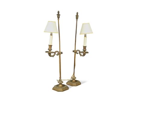 the height adjustable scrolling arms to a square column attached to loaded bases,75cm highProvenance:Property from a Suffolk 