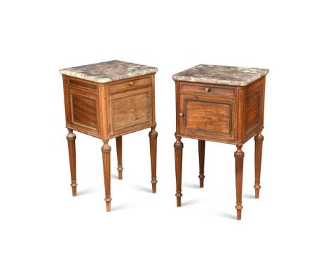 the marble tops above a frieze and cupboard drawer, on fluted legs, each with bone label Mellier &amp; Co., Albemarle St, Lon