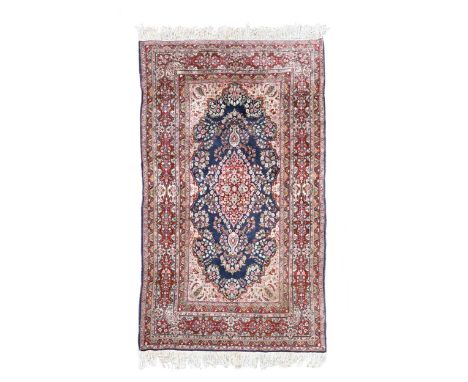 with central medallion on an indigo ground,250 x 136cmProvenance:Landwade Hall, Exning, SuffolkCondition report: Excellent, e