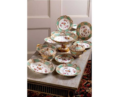 painted with scattered flowers, within green dot borders and C-scrolled and acanthus moulded gilt rims, comprising; a comport