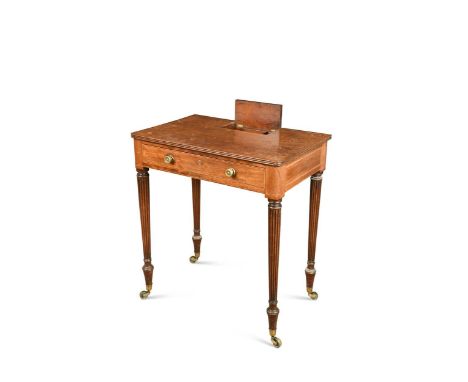 with rounded rectangluar top and hinged rear fitted section and frieze drawer on fluted legs 76 x 69 x 46cmCondition report: 