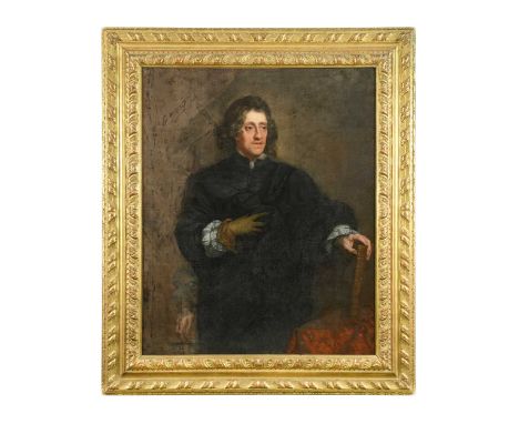 Portrait of a gentleman, three-quarter-length, wearing black, standing by a desk holding a book in his left handoil on canvas