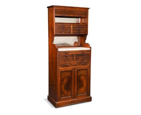 the tambour fronted top concealing a mirror above eight slim graduated drawers, the white opaque glass top and slide above a 