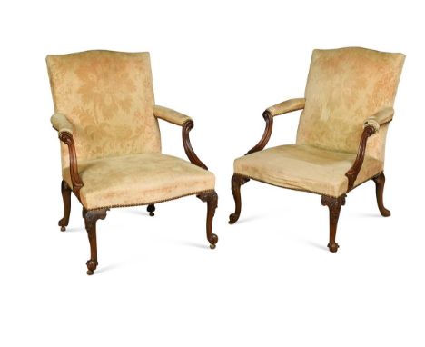 each with serpentine-crested padded back, armrest and seat, on carved cabriole legs,100 x 72 x 78cmProvenance:Landwade Hall, 