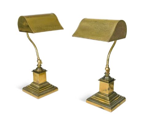 each with adjustable stems and raised on a stepped Corinthian style base,45cm highCondition report: Some wear and light pitti