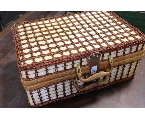 A WICKER PICNIC HAMPER WITH CONTENTS 