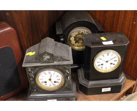 THREE ASSORTED MANTLE CLOCKS, comprising two wooden cased examples with striking movements and a bell strike black slate cloc