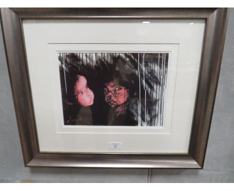 A FRAMED AND GLAZED ROLF HARRIS PRINT ' ALL YOU NEED IS LOVE'